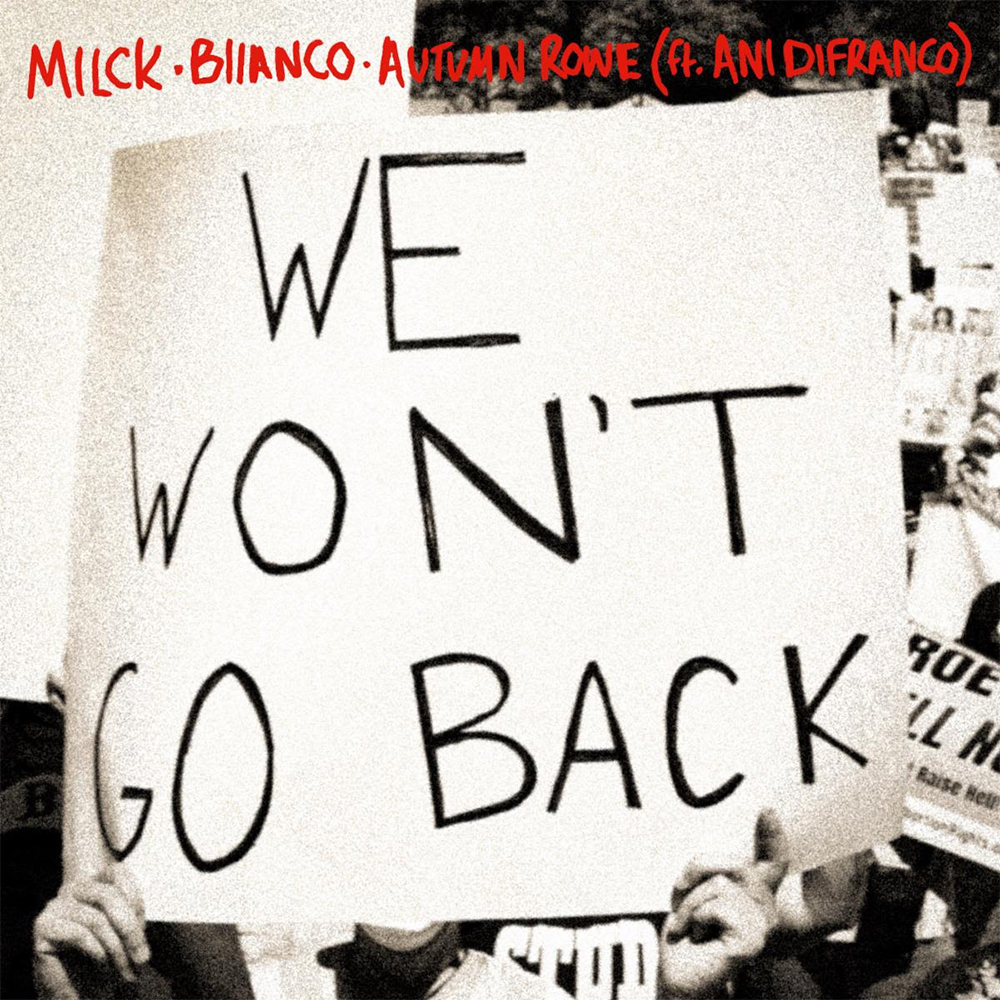 Cover art for Milck's "We Won't Go Back". A protest sign is held with the title words on it.