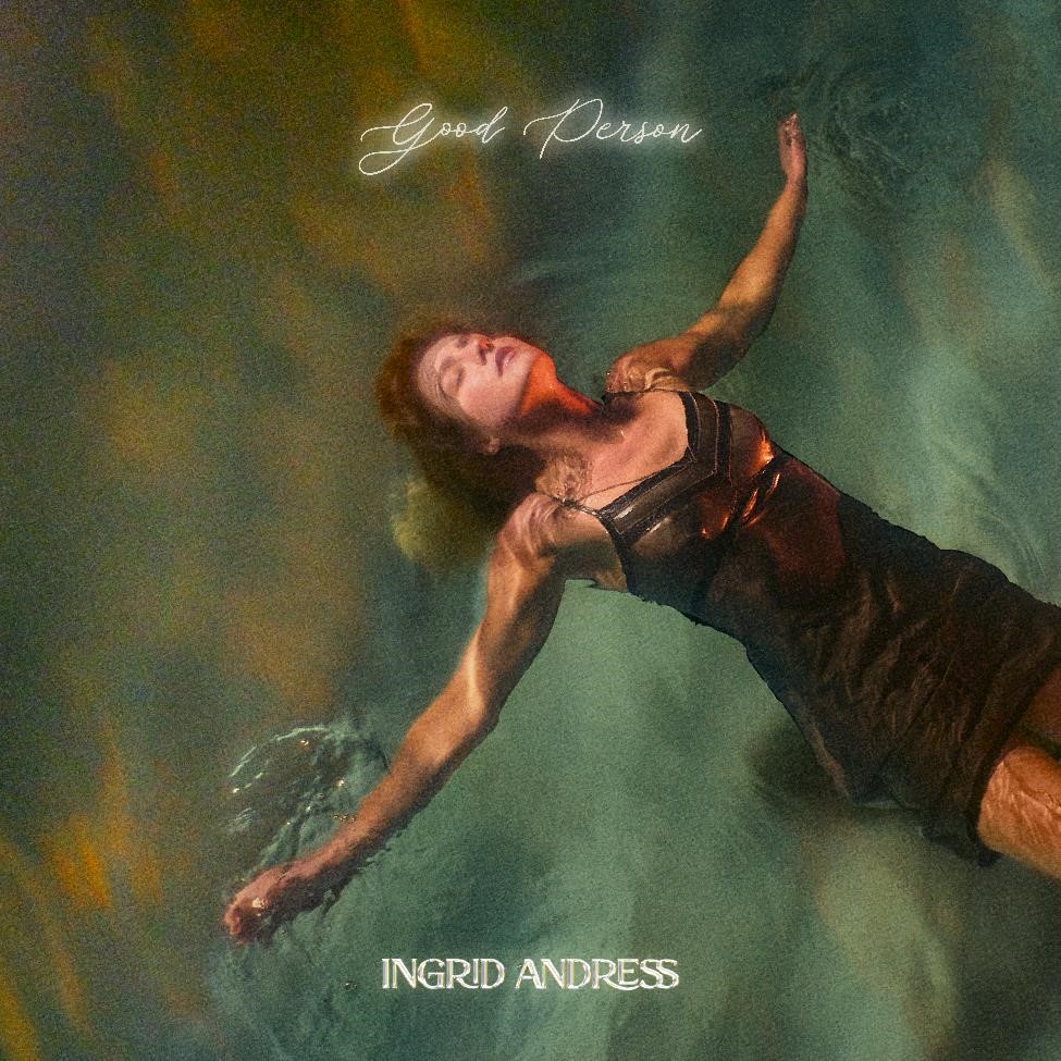Cover image of Ingrid Andress' album "Good Person"; a woman floats in water wearing a flowing tank top dress.